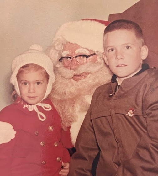 Young Catherine Gugerty with Santa and brother