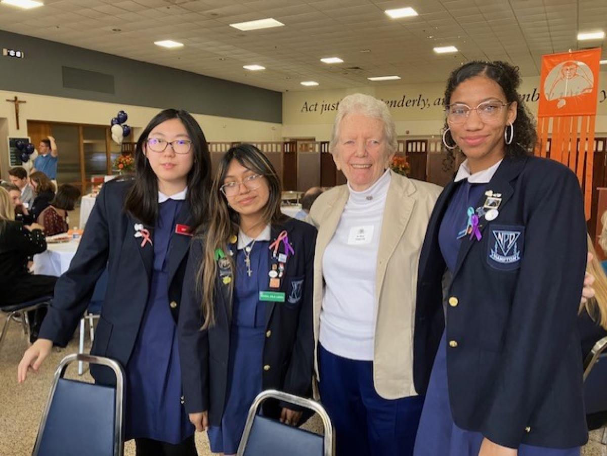 In the picture, left to right: Abby Park, Krystal Avila-Larios, Sister Mary, Sydney Newkirk