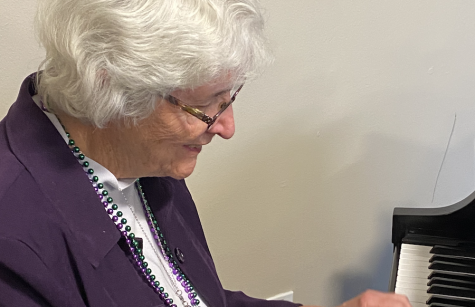 Sister Delia Dowling plays piano