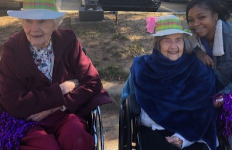 Sisters Therese Feeley and Kathleen Engers with Shantel Williams